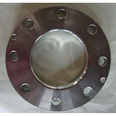 This is a stainless steel raised face plate flange with a metallic surface (showing a reddish tint due to lighting). It features a central raised sealing area (RF) and multiple evenly arranged bolt holes around the edge, designed for secure, leak-proof connections in industrial piping systems.