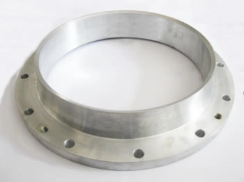 A large-diameter steel weld neck flange is shown, with a wide, smooth flange plate, evenly distributed bolt holes, and a thick neck structure. Its metallic finish and robust design make it suitable for large-scale pipeline systems.