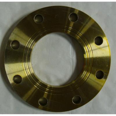 A brass raised face (RF) flange is shown, featuring a golden metallic finish, a raised sealing surface (for tight connections), and evenly spaced bolt holes. Its smooth, textured plate design suits corrosion-resistant pipeline systems.